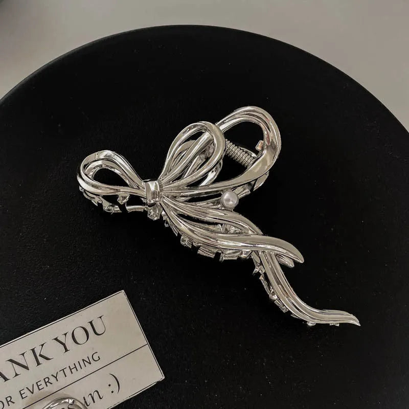 Silver metal hair claw barrette example from a range of 44 Korean-style designs.