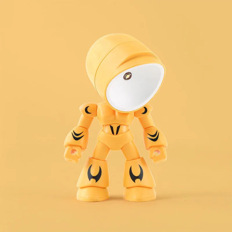 Mini mecha robot hero LED night light with adjustable arms on a desk.
