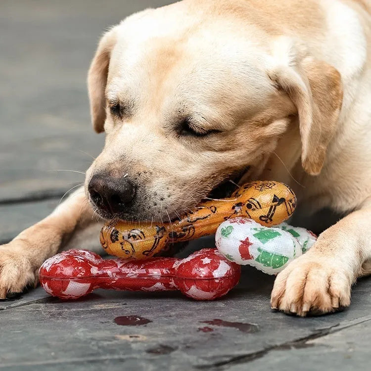 TPR nibbling sound toy for dogs made from printed bone TPR material that produces noise when bitten for interactive pet play and training, available in Christmas red, Christmas colour, Halloween colour and Halloween pumpkin colour.