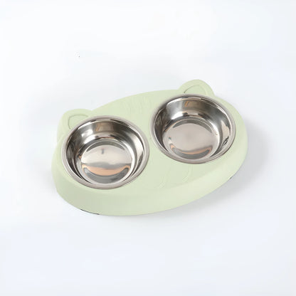 Blue macaron-shaped plastic pet feeder with two food bowls.