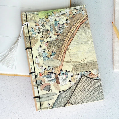 A5 antique wire-bound notebook with classical artwork cover, black oil wax rope binding, and decorative tassels