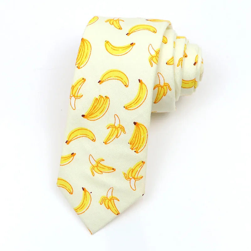 Korean style narrow men's cotton bow tie with a printed cartoon pattern on an adjustable fabric strap.