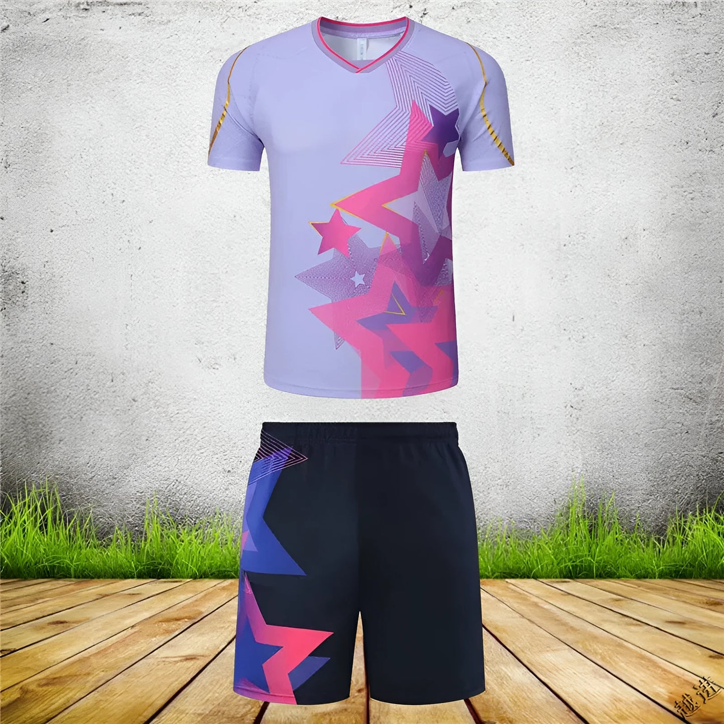 A man and woman modelling a blue and purple badminton sportswear outfit consisting of a short-sleeved top and trousers.