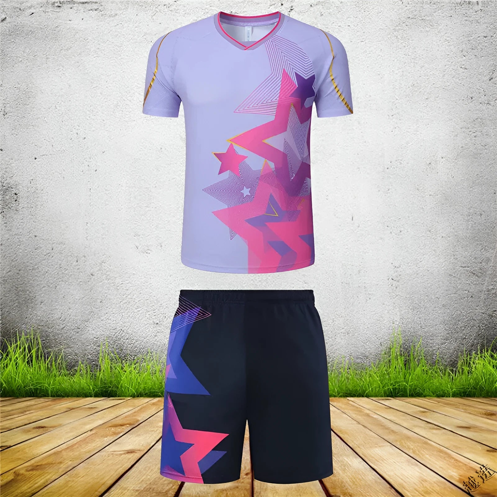 A man and woman modelling a blue and purple badminton sportswear outfit consisting of a short-sleeved top and trousers.