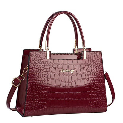 A medium-hard PU leather one-shoulder handbag in a horizontal square shape, shown in multiple colour options.