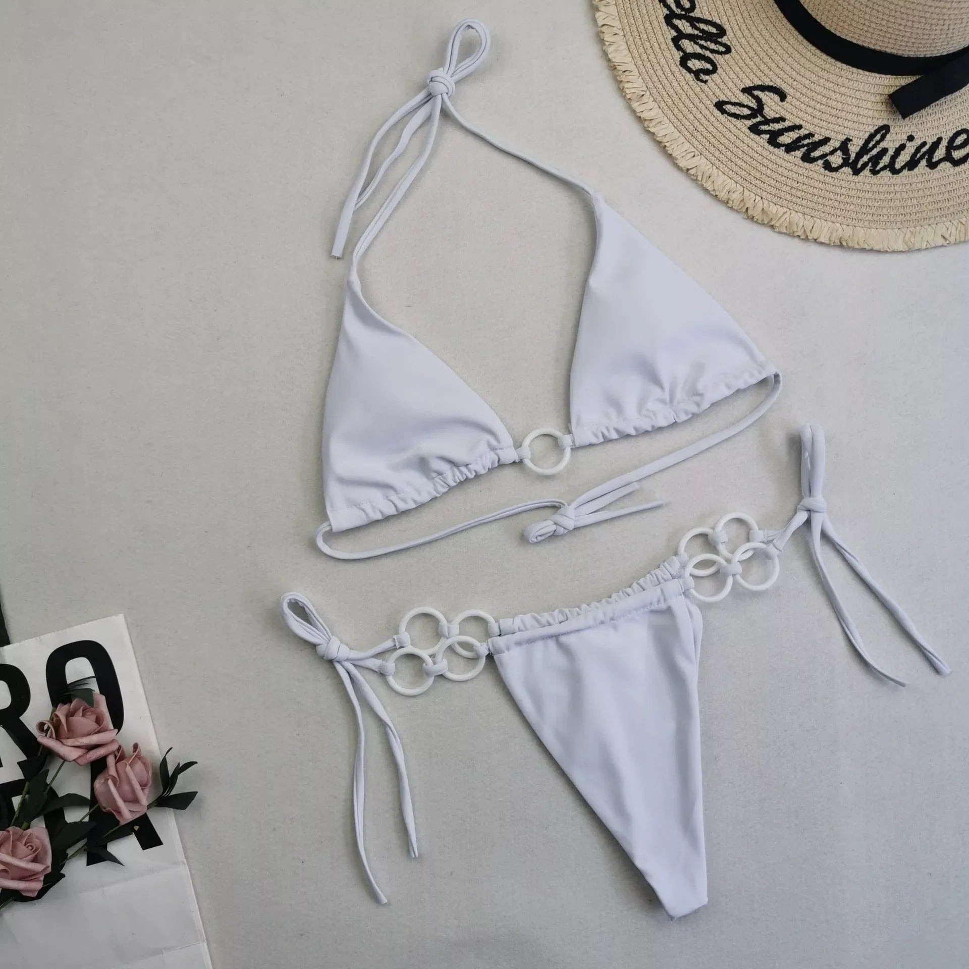 Women's split bikini with lace-up design and double fabric in various colours