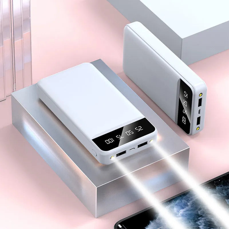 20000 MA power bank in black, white, pink, or blue colours, showing USB ports and compact size.