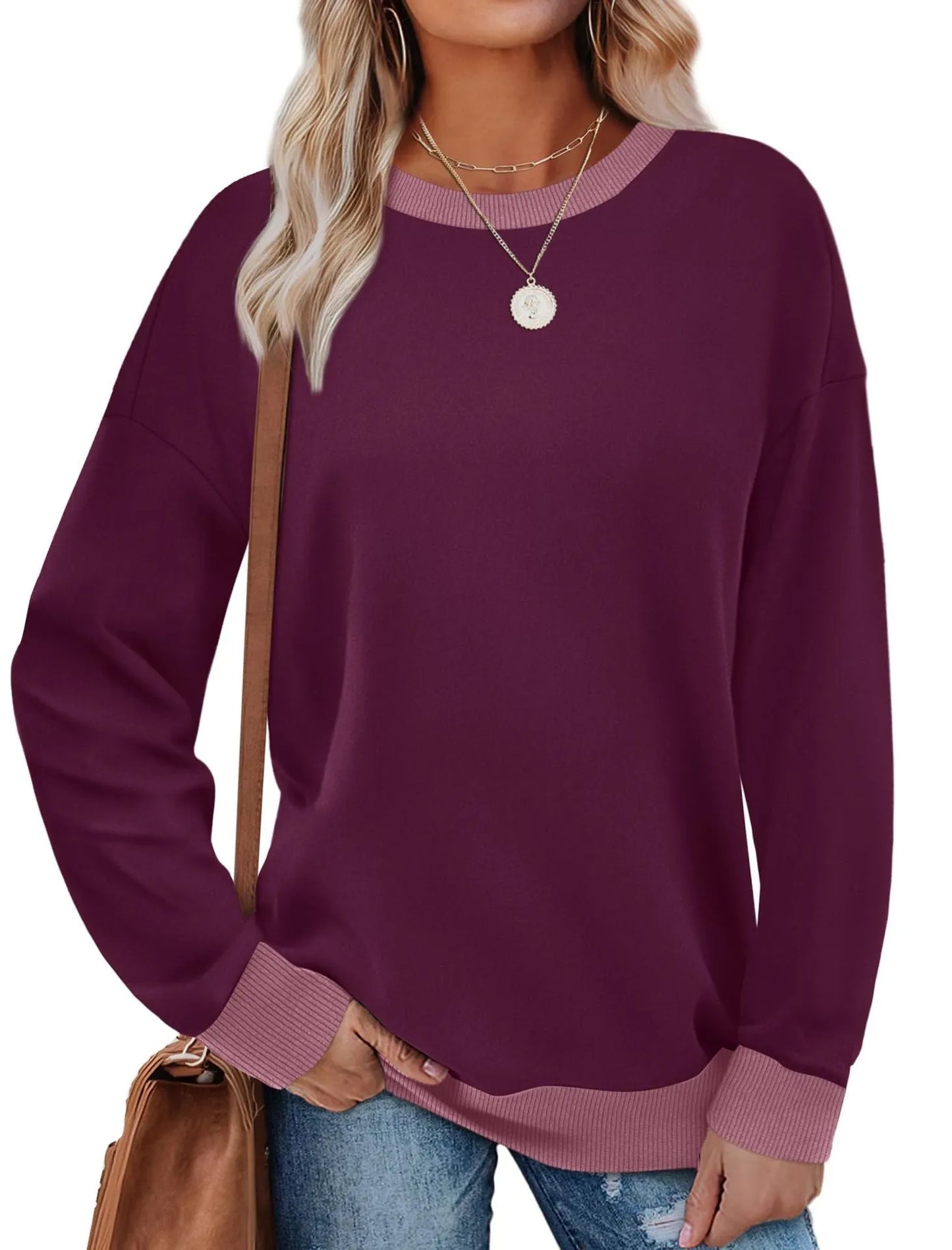 Loose fit striped long sleeve top for women on a hanger, shown in apricot colour.