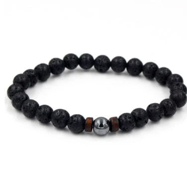 A stylish and durable men's bracelet made with volcanic stone, flash stone, and wood chips