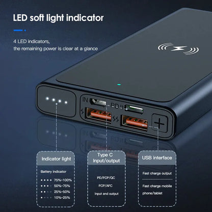 Black and blue alloy 10000mAh power bank with wireless charging surface and integrated plug.