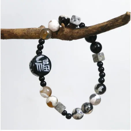 Hand-woven black agate ceramic bracelet with natural glitter stones and geometric design