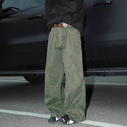 Man wearing pleated straight-leg trousers in a striped pattern with a micro elastic mid waist.