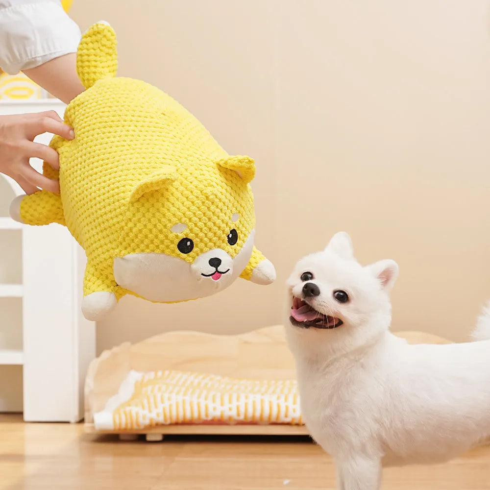 Bite-resistant plush dog toy in pillow shape with squeaker for calming and teething support