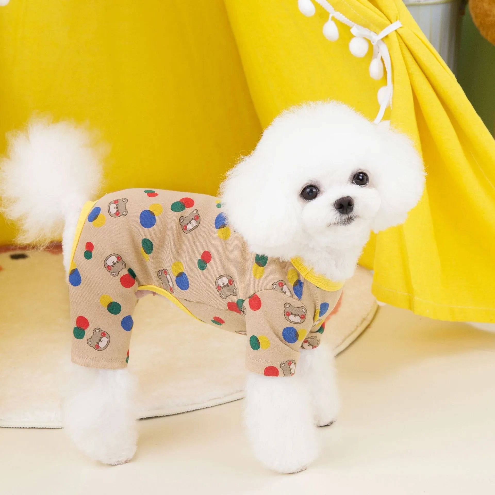 Beige dog clothing with colourful ball bear design, made from cotton and spandex blend, size L shown.