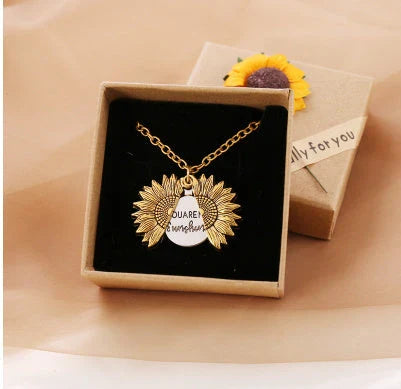 A stunning sunflower pendant necklace with an adjustable chain, crafted from high-quality materials for a radiant and versatile accessory.