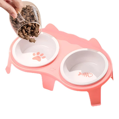 Ceramic cat food and water bowl set in elevated tilted stand, shown in blue, pink, white, and yellow colour options.