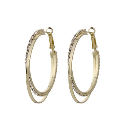 Elegant geometric metal earrings for women in gold and silver finishes