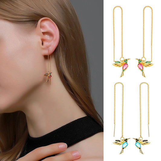 Elegant hummingbird crystal pendant earrings for women in rose gold, imitation gold, and anti-gold finishes.
