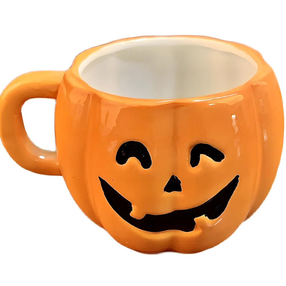 Ceramic Halloween pumpkin mug with cartoon face, 350ml capacity, 7.5cm diameter, includes matching spoon for seasonal drinks