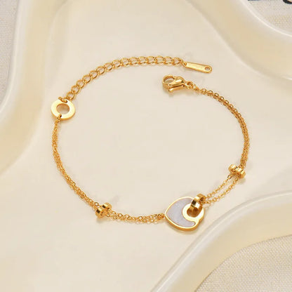 Women's stainless steel bracelet with double-layered heart design and resin accents, showing adjustable clasp and electroplated finish