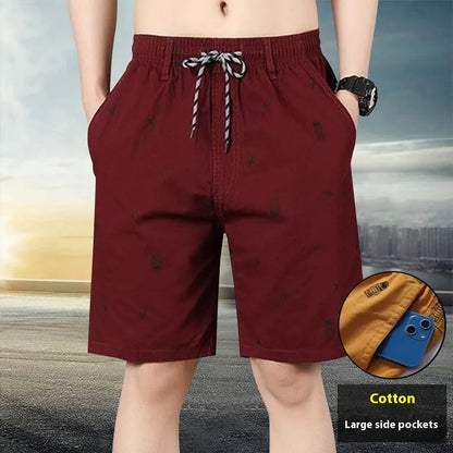 Women's army green loose cropped cotton summer trousers on a white background.
