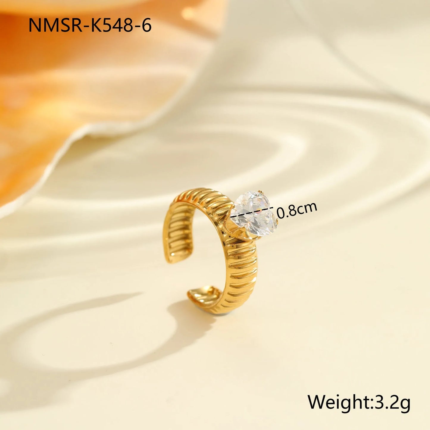 Gold electroplated stainless steel ring with heart shape design and open mouth fitting