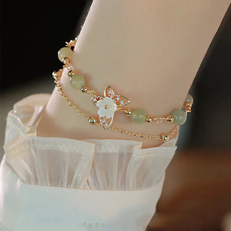 Yellow gold electroplated copper butterfly bracelet with geometric shapes for women