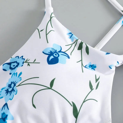 Floral tie-neck triangle bikini top with matching ruffle shorts swimsuit set