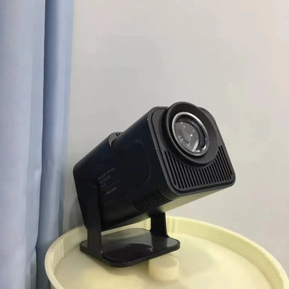 Handheld wireless HD game projector showing 720p resolution for home use.