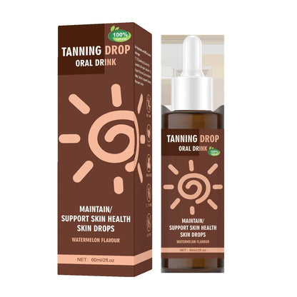 60ml bottle of tanning drops with dropper applicator for gradual bronze tan application