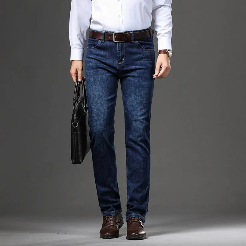 Men's straight-leg stretch jeans in black or blue denim with a zip fly, shown laid flat.