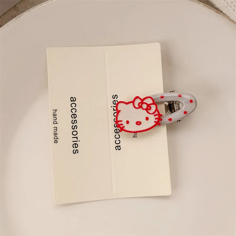 Red love heart-shaped hair barrette clip with retro white dots on a willow leaf-shaped base.