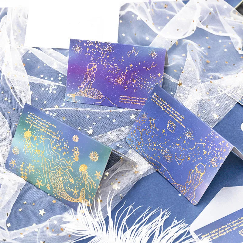 Set of three bronzed sulfuric acid paper greeting card envelopes in one of four colour designs.