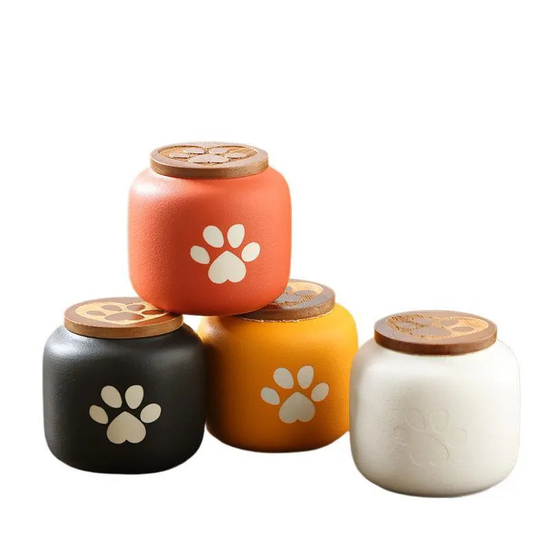 Ceramic pet funeral urn with foot print design in choice of colours and 180ml or 500ml sizes