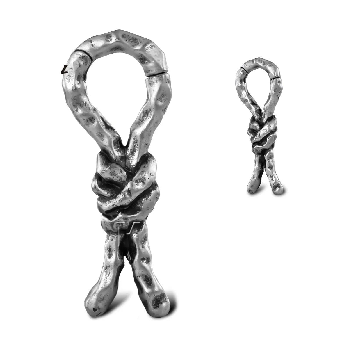 Close-up of 4mm copper earrings with a bending, hitch design for cartilage piercings.