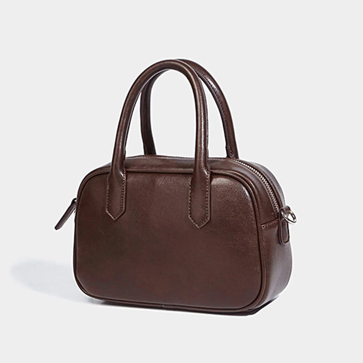 Small square retro messenger bag with single shoulder strap in black or coffee colour