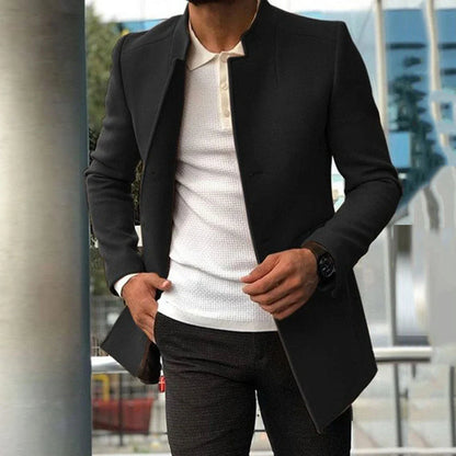 A single-breasted wool-blend coat in various colours, showcasing a tailored silhouette and premium British craftsmanship.