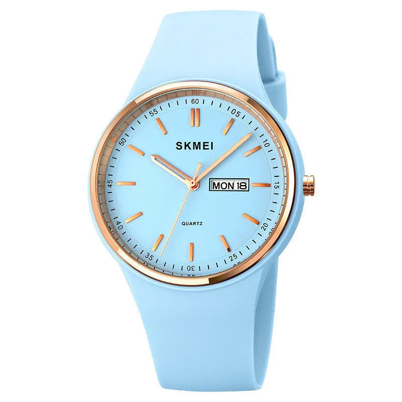 Women's quartz watch with a silicone strap and calendar on a 42mm white dial.