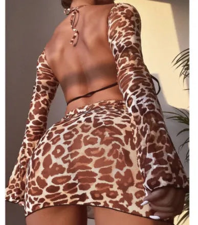 Women's leopard print bikini swimsuit set with matching top, skirt and panties