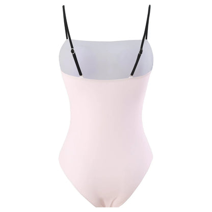 Women's one-piece bikini swimsuit with a white tulle skirt overlay on a mannequin.
