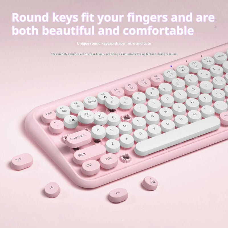Bluetooth keyboard with 84 keys in pink ABS plastic measuring 339.26 x 151.44 x 30 mm, featuring crater architecture button technology for dual-mode wireless typing on multiple devices with a portable 800g weight