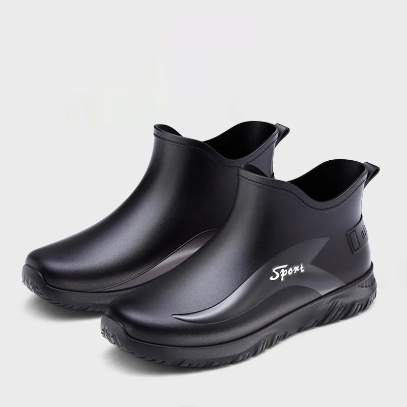 Men's short PVC rubber boots in beige, black, and black-red colours with a non-slip flat sole.