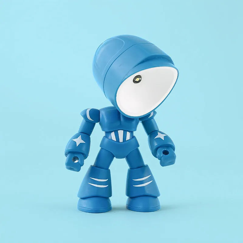 Mini mecha robot hero LED night light with adjustable arms on a desk.