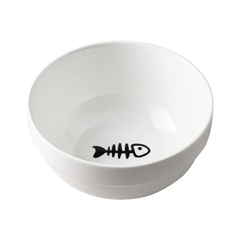 White ceramic pet bowl with cat paw print in a black iron stand with cat ear details