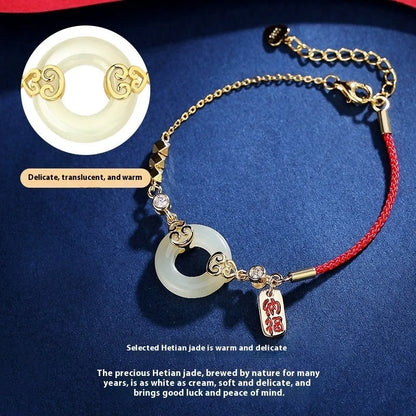 Chinese style sterling silver and Hetian jade jewellery set with bracelet, necklace, and earrings.