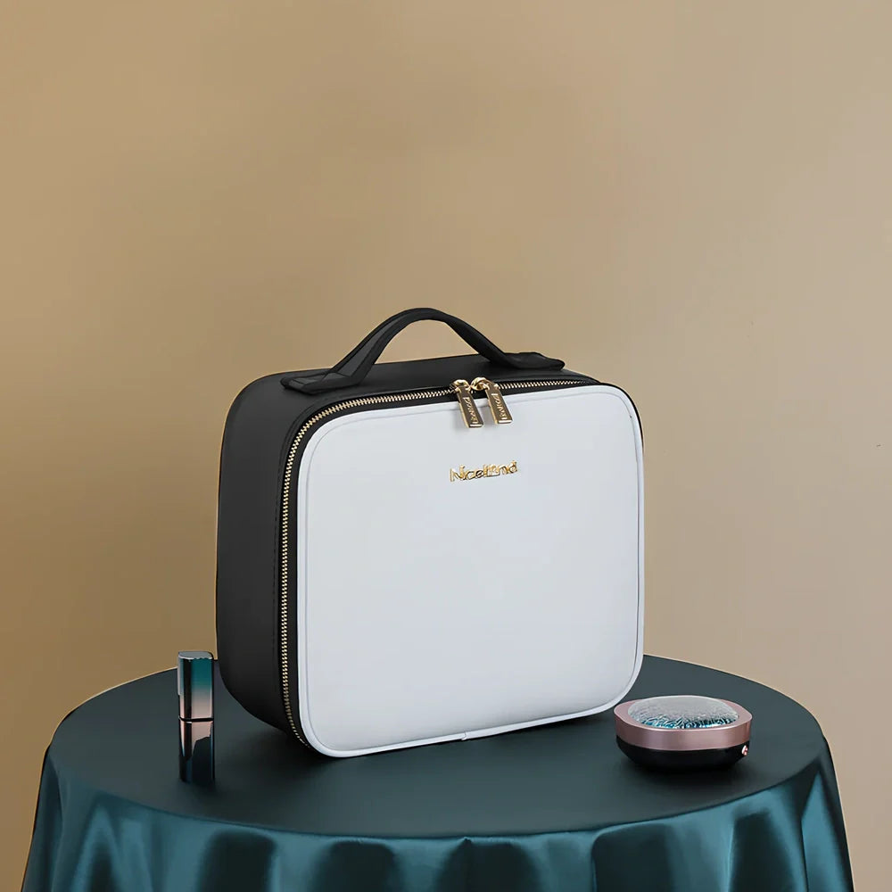 Large cosmetics bag with LED mirror light in black, measuring 26cm wide with USB charger