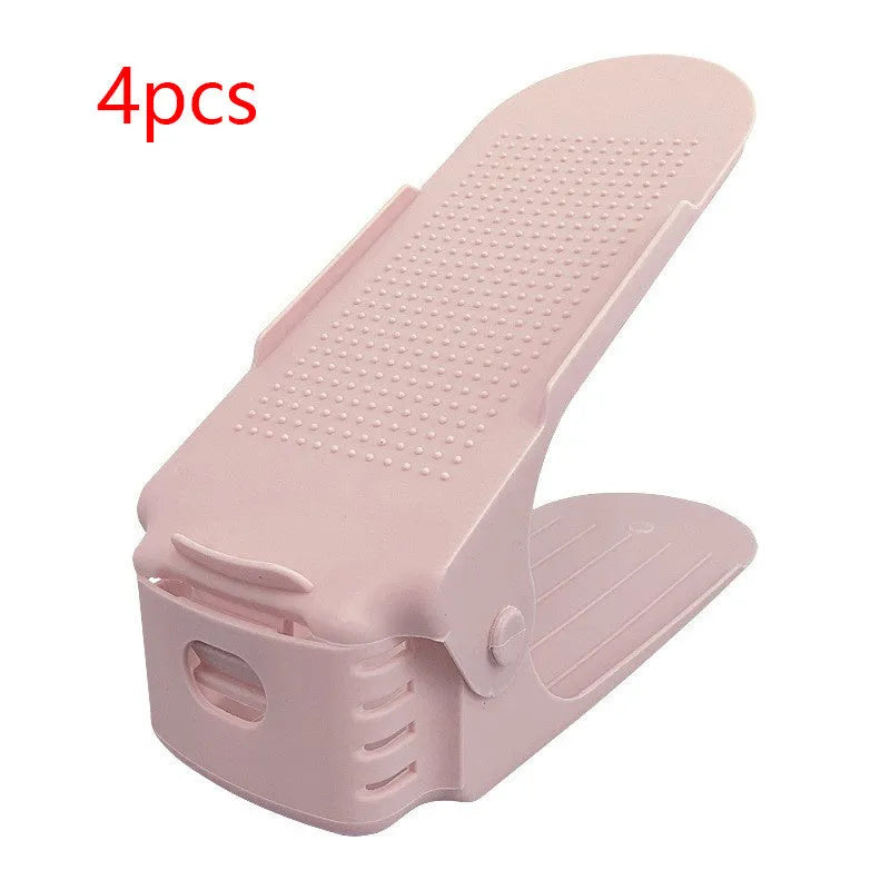 A stackable plastic shoe storage cabinet with two open shelves, shown in a choice of colours.