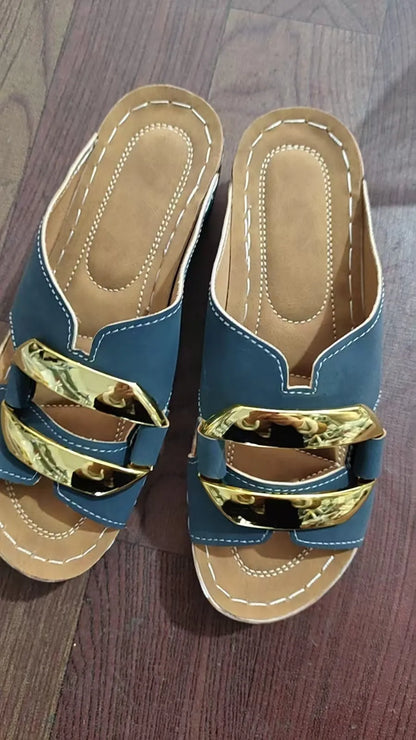 Roman-style platform flip-flop sandals in black, white, khaki, and sea blue on a rubber sole.