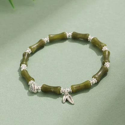 Green aventurine bamboo strawberry crystal bracelet with mixed natural stones and adjustable closure
