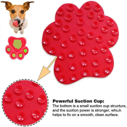 Bone-shaped blue silicone dog licking mat with suction cups on a tile surface
